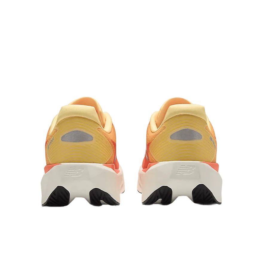 New Balance Men's FuelCell Rebel v5 – Tangerine Heat with Silver Metallic - Image 6